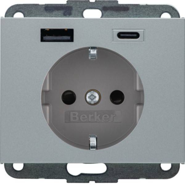 Einzelne europäische Wandsteckdose im europäischen Stil mit zwei runden Steckerlöchern und USB-A- und USB-C-Ladeanschlüssen darüber, Marke Berker.