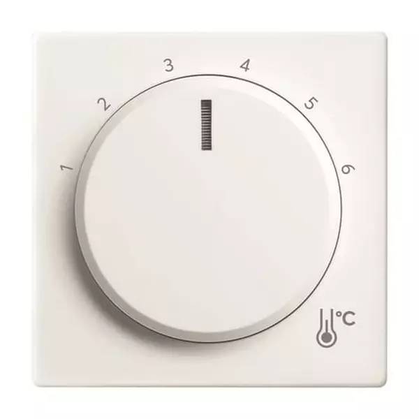 Weißes Thermostat-Drehrad mit Zahlen 1 bis 6 und einem Thermometer-Symbol gekennzeichnet mit 