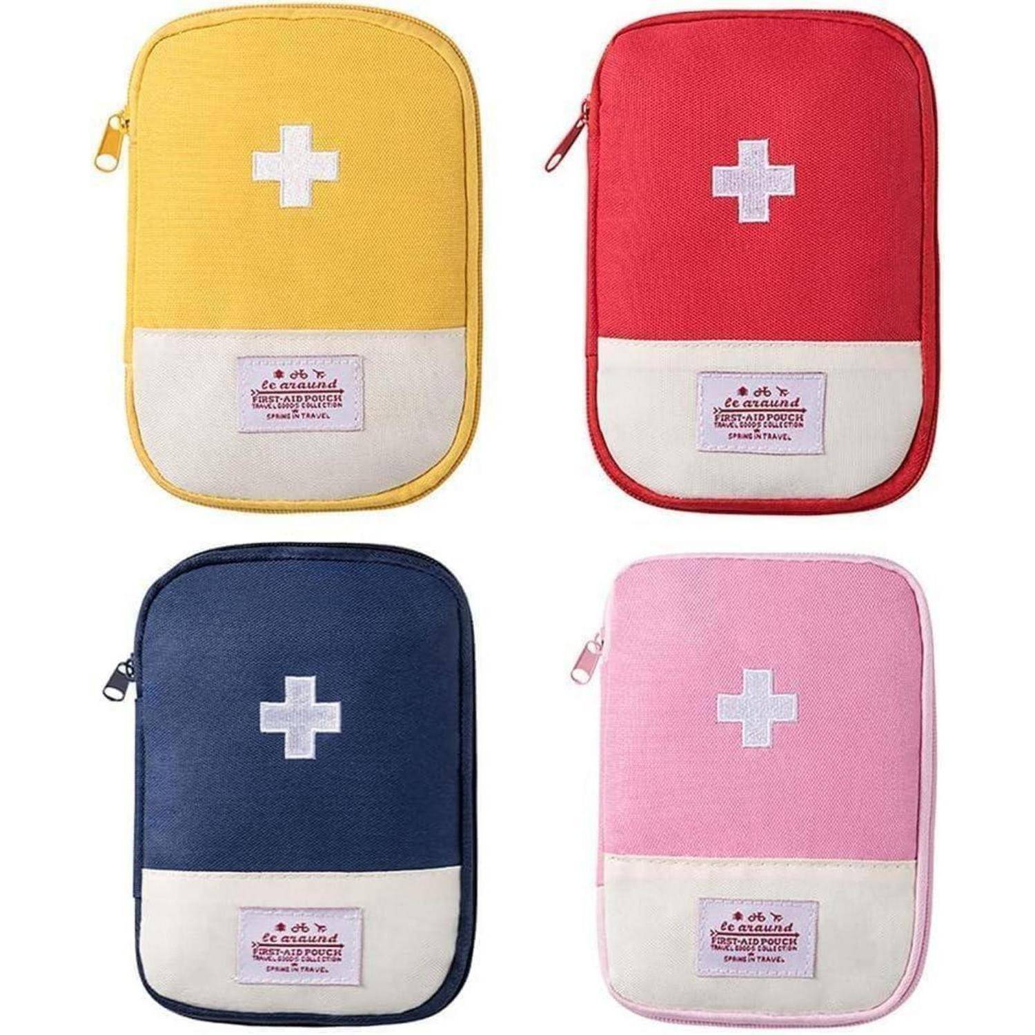 Vier kleine Erste-Hilfe-Taschen mit Reißverschluss in Gelb, Rot, Dunkelblau und Rosa, jede mit weißem Kreuz und Vordertasche.