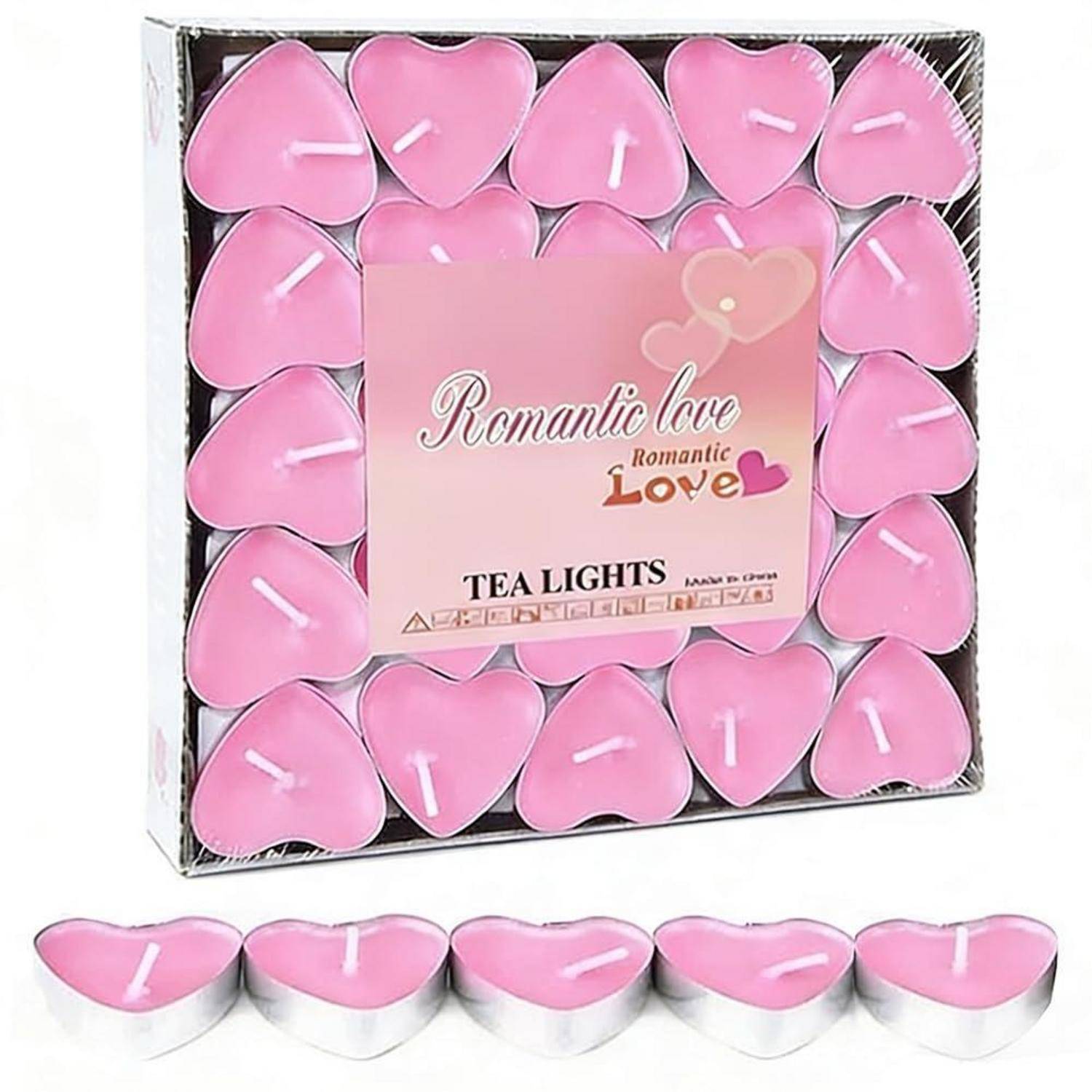 Schachtel mit rosa herzförmigen Teelicht-Kerzen mit einem Label „Romantic Love