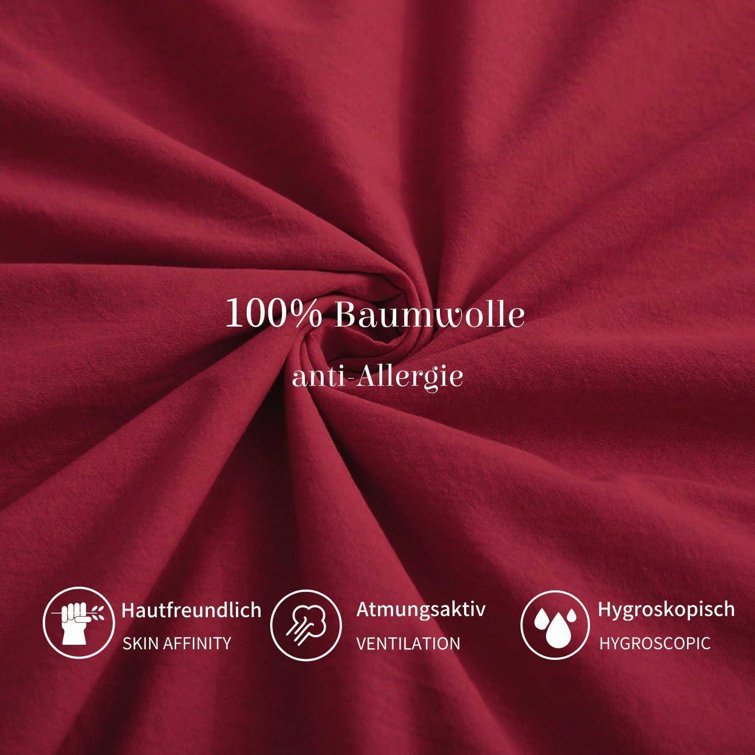 Rotes Stoffwirbel mit Text „100% Baumwolle" und „Anti-Allergie""; Symbole kennzeichnen hautfreundlich, atmungsaktiv und hygroskopisch.