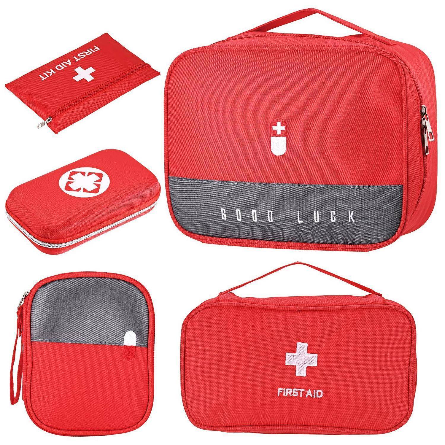 Satz von roten Erste-Hilfe-Kits und Beuteln, einschließlich einer großen Tasche mit der Aufschrift „VIEL GLÜCK