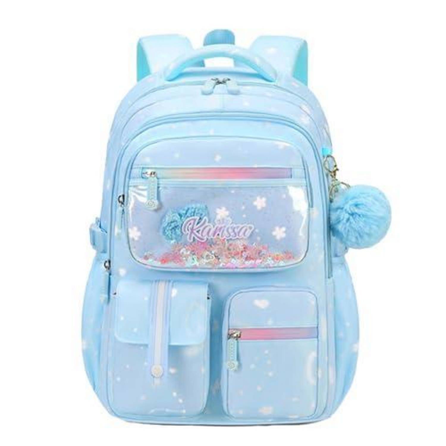 Hellblauer Rucksack mit vorderen Taschen, flauschigem Bommel-Anhänger und transparentem Fenster, das "Kansso"" und konfetti-ähnliche Dekorationen zeigt.