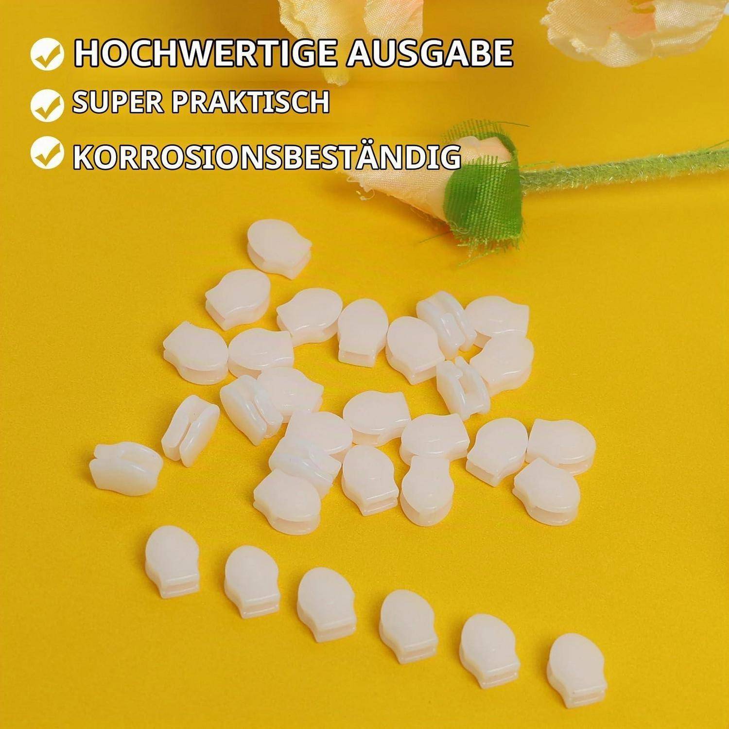 Weiße Kunststoffclips verstreut auf gelbem Hintergrund, mit Text in deutscher Sprache, der "HOCHWERTIGE AUSGABE"", ""SUPER PRAKTISCH"" und ""KORROSIONSBESTÄNDIG"" liest.