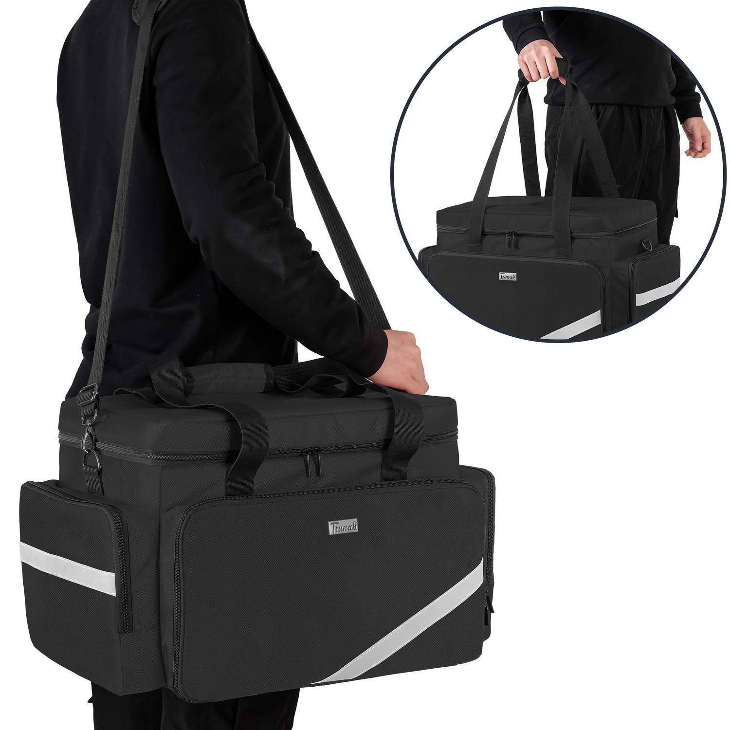 Schwarze isolierte Tragetasche mit Schultergurt und Seitentasche, wird von Hand getragen; Einsatz zeigt die Tasche aus einem anderen Winkel.
