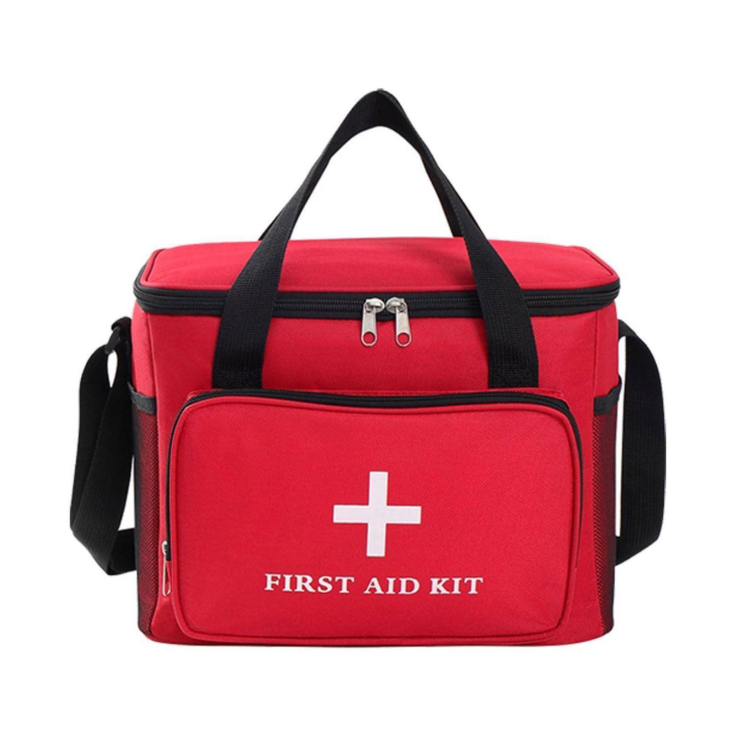 Rote Erste-Hilfe-Tasche mit schwarzen Griffen und Riemen, vordere Tasche mit der Aufschrift „ERSTE-HILFE-SET