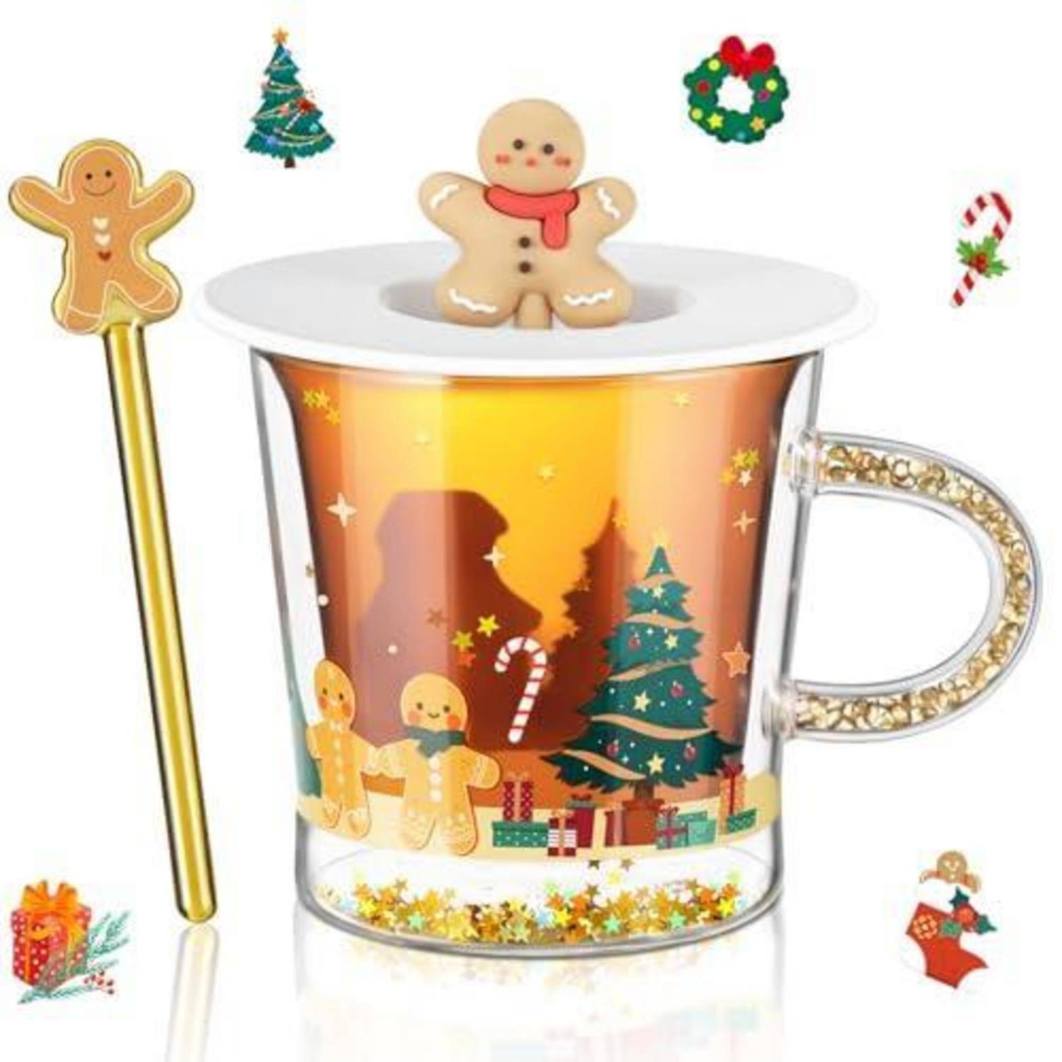 Weihnachtlich gestaltete durchsichtige Glastasse mit goldenem Griff, Lebkuchenmann auf dem Deckel, festliche Weihnachtsdekoration und passendem Lebkuchen-Rührstab.