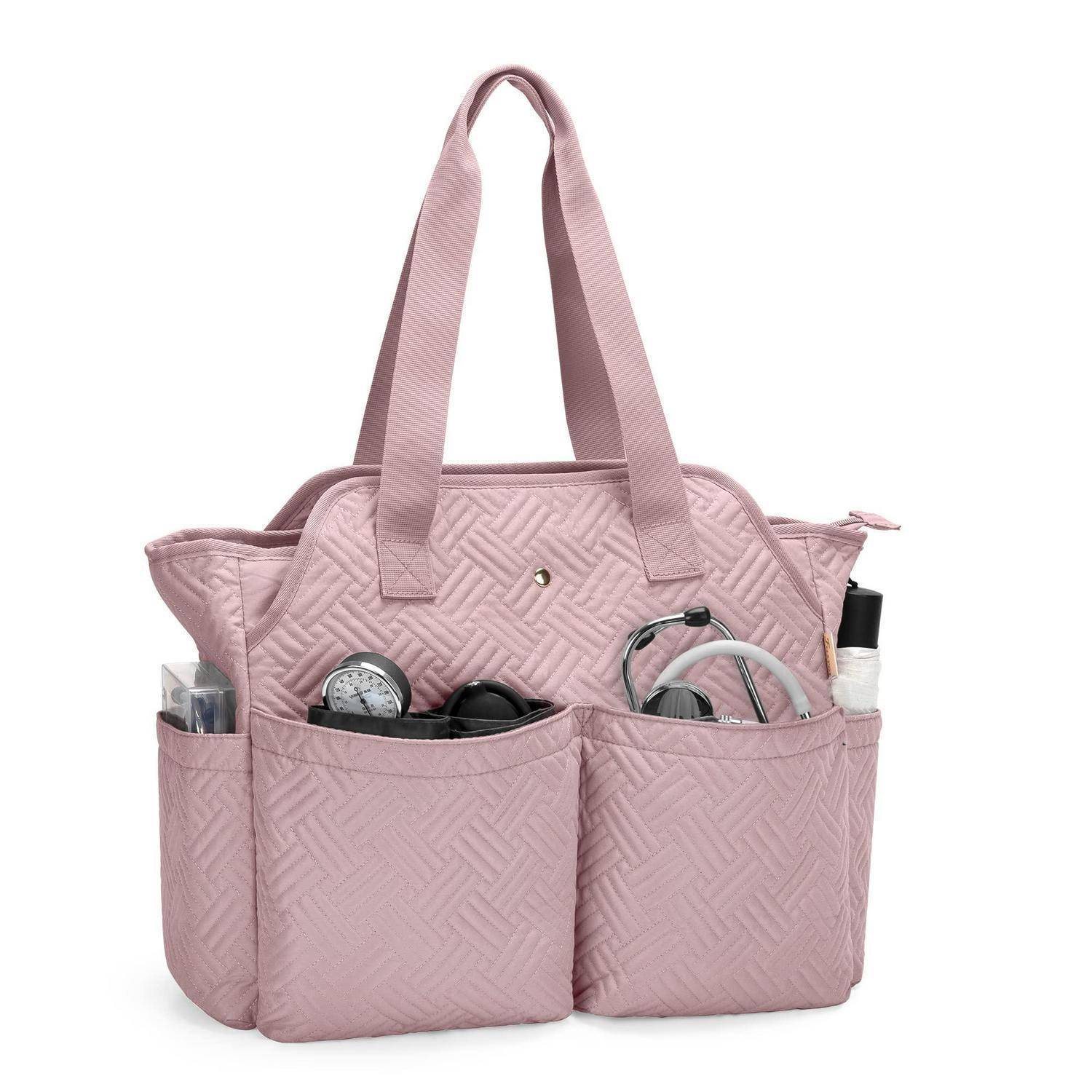 Rosa gesteppte Tragetasche mit mehreren äußeren Taschen, gefüllt mit Reise- oder alltäglichen Essentials dargestellt.