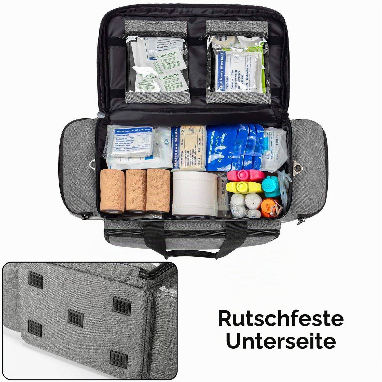 Öffnen Sie die Erste-Hilfe-Tasche mit organisierten medizinischen Materialien; die Vergrößerung zeigt den rutschfesten Boden, gekennzeichnet mit „Rutschfeste Unterseite" auf Deutsch.