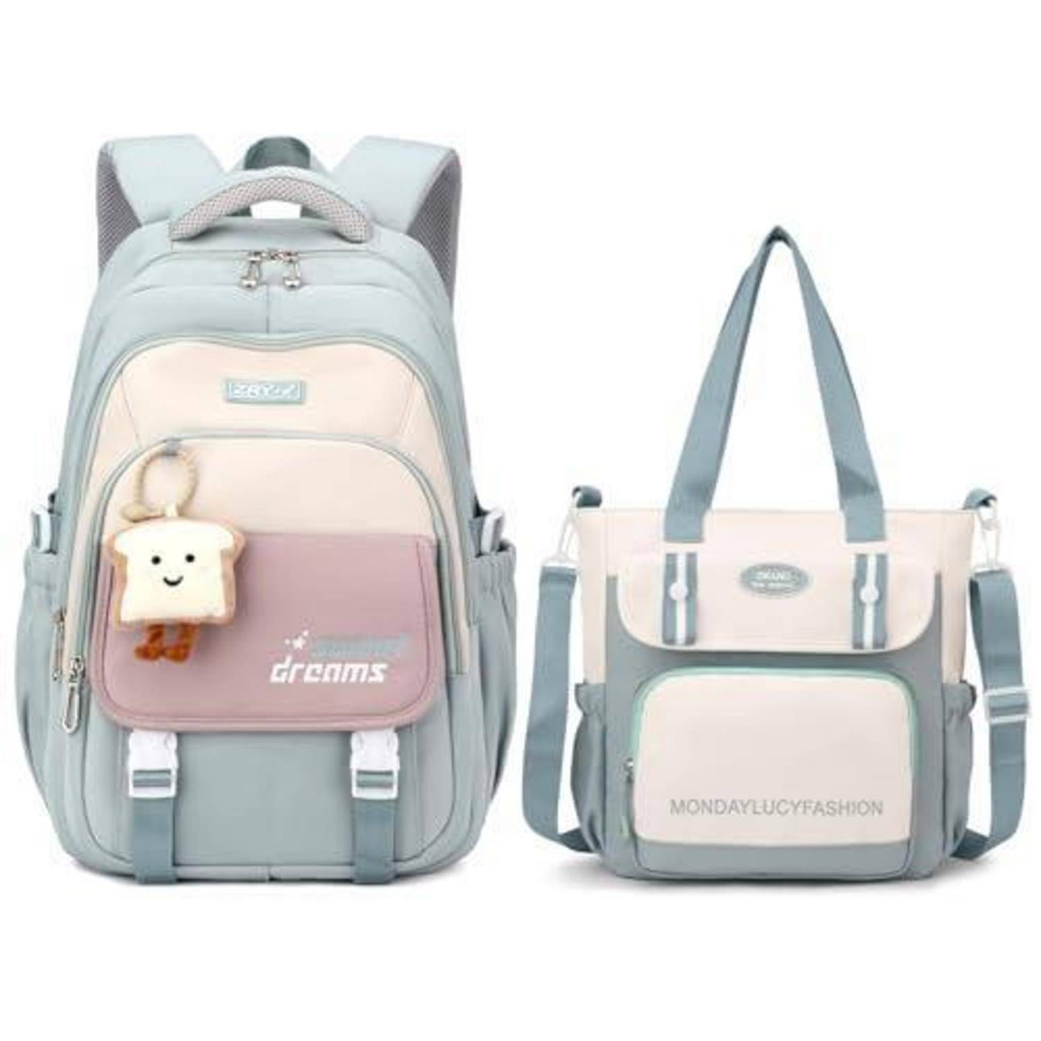 Hellblauer Rucksack und passende Umhängetasche mit creme- und rosafarbenen Panels; Rucksack hat einen lächelnden Brot-Schlüsselanhänger und "dreams""-Text.