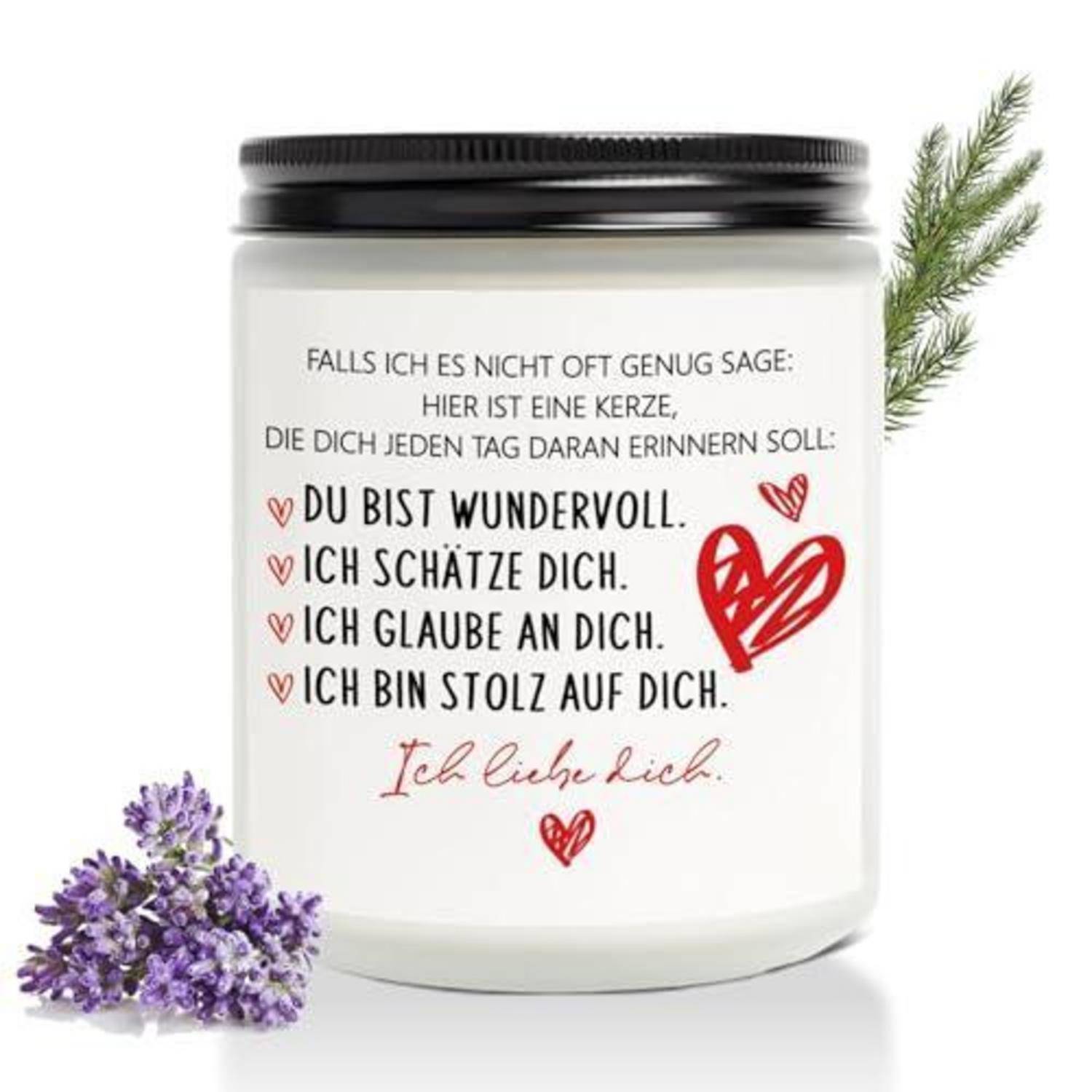 Ein weißes Kerzenglasaufkleber mit deutscher Liebesbotschaft: „Du bist wundervoll. Ich schätze dich. Ich glaube an dich. Ich bin stolz auf dich." mit roten Herzen und Blumen.