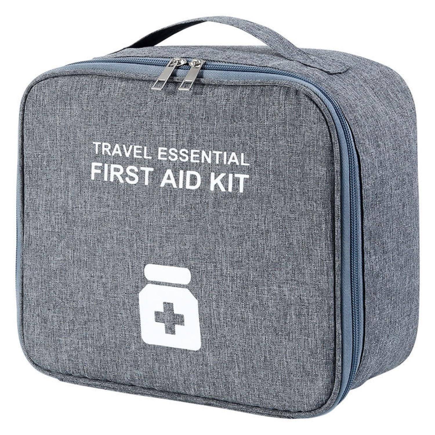 Grauer Reise-Erste-Hilfe-Kasten mit Reißverschluss und Griff, mit der Aufschrift „TRAVEL ESSENTIAL FIRST AID KIT