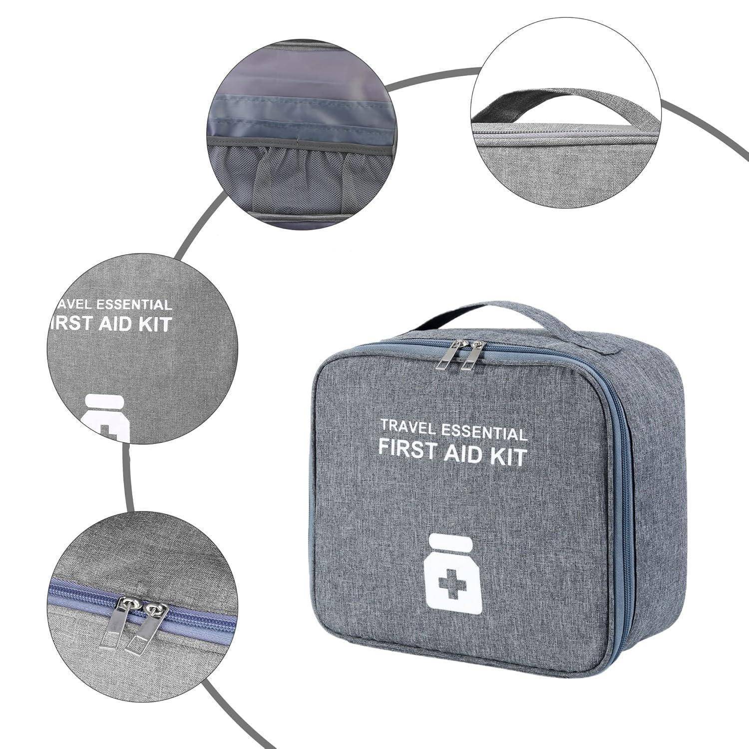 Grau Reise-Erste-Hilfe-Tasche mit Griff, Reißverschlussfächern und weißem Etikett "TRAVEL ESSENTIAL FIRST AID KIT"" mit Medizinkreuz-Symbol.