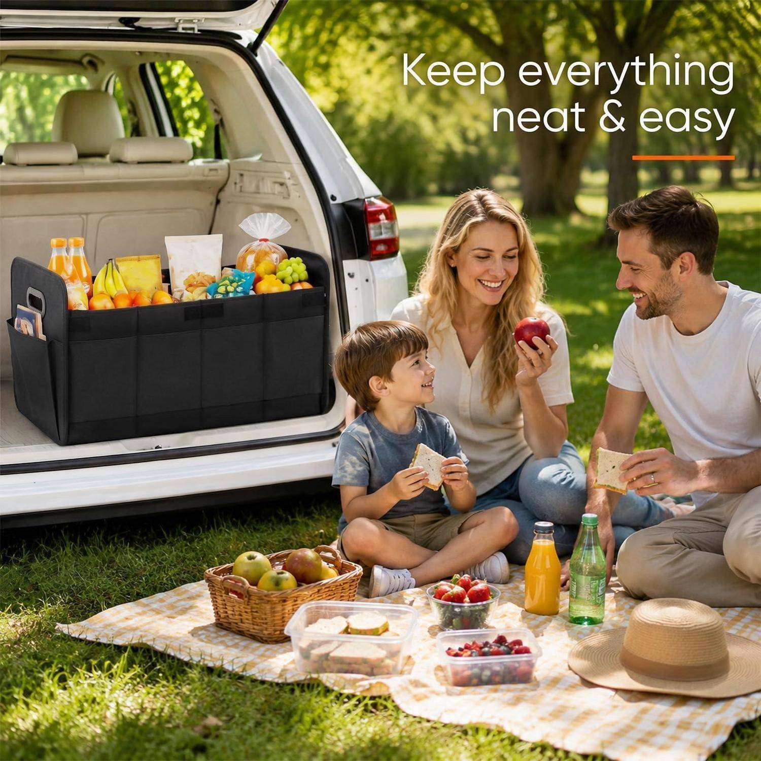 Familie beim Picknick neben offenem SUV mit organisierter Kofferraumbox; Text sagt „Halte alles ordentlich & einfach".