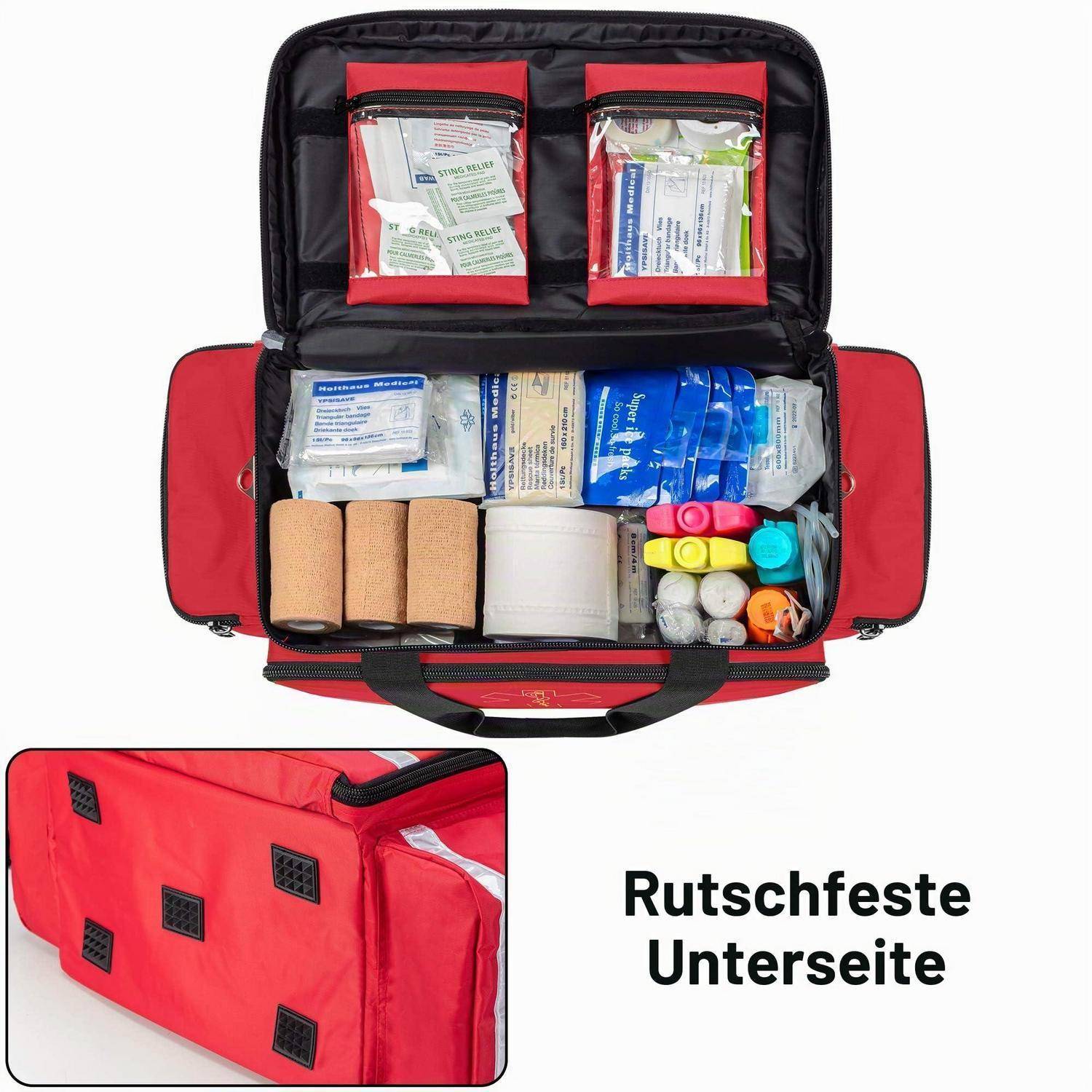 Offene rote Erste-Hilfe-Tasche mit organisierten medizinischen Verbrauchsmaterialien und beschrifteter rutschfester Unterseite, dargestellt mit Detailausschnitt und deutschem Text „Rutschfeste Unterseite".
