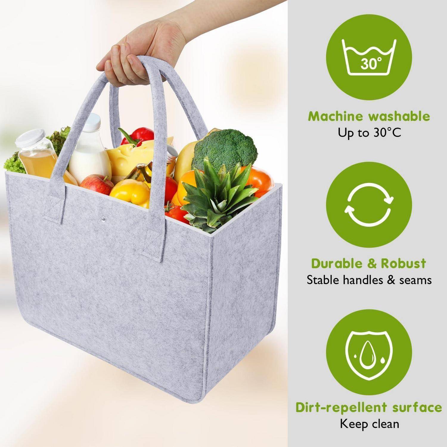 Graue Filz-Einkaufstasche gefüllt mit Obst und Gemüse, gezeigt mit Symbolen, die besagen, dass sie maschinenwaschbar bis 30°C, langlebig und robust sowie mit schmutzabweisender Oberfläche ist.
