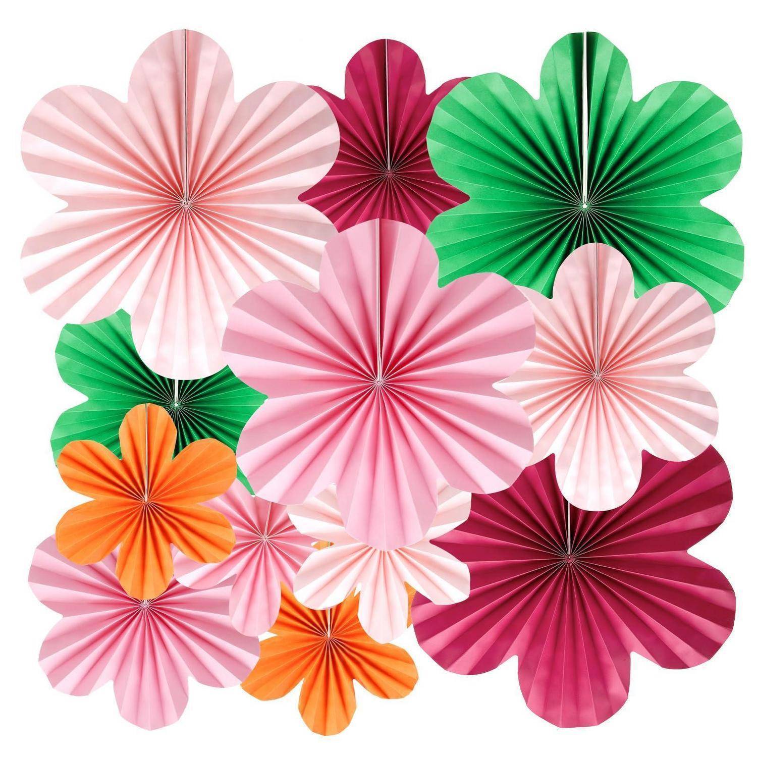 Dekorative Anordnung von bunten Papierfächerblumen in Rosa, Grün, Magenta, Orange und Weiß auf weißem Hintergrund.
