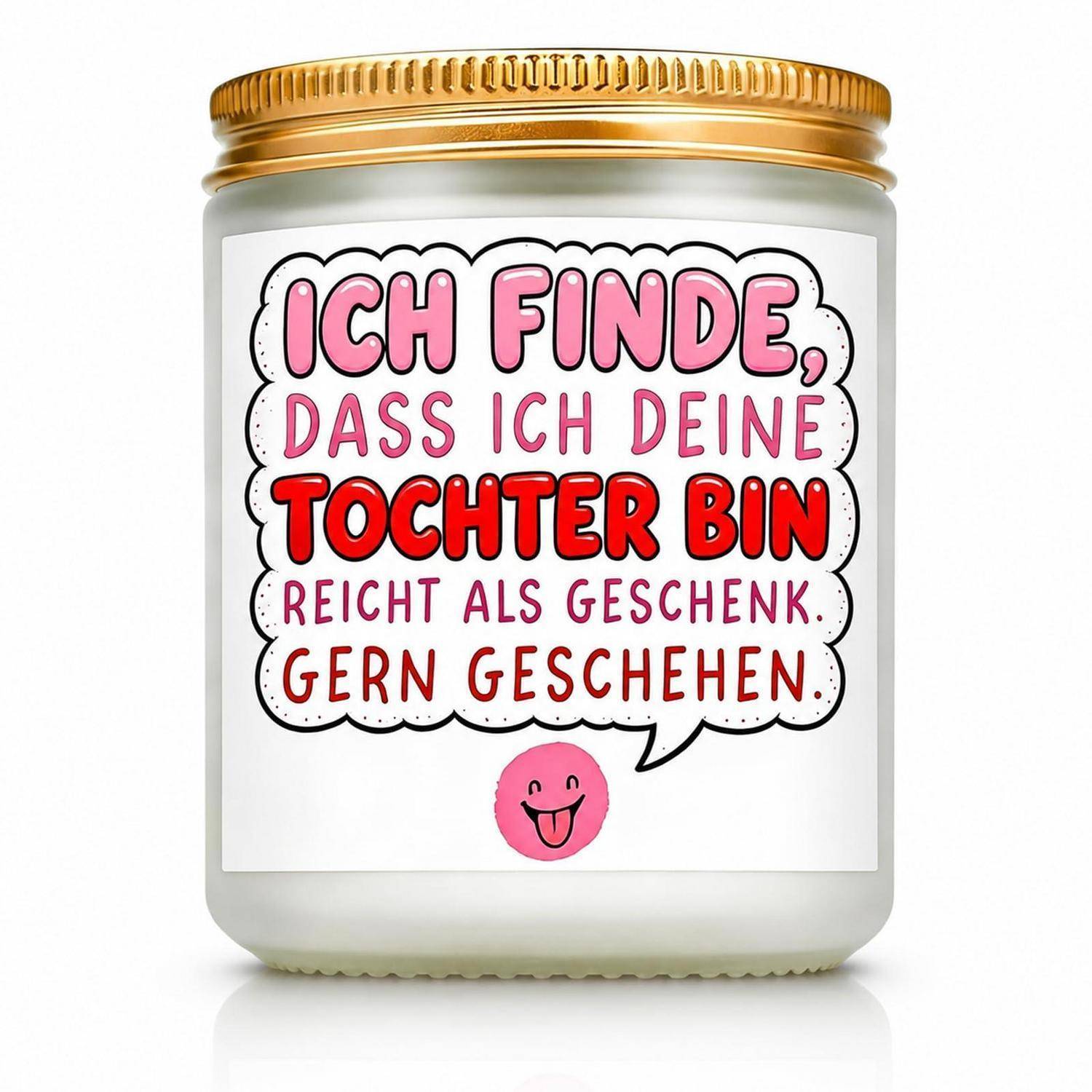 Ein Glasgefäß-Kerzenhalter mit einem Golddeckel und einem Etikett mit der Aufschrift „Ich finde, dass ich deine Tochter bin reicht als Geschenk. Gern geschehen.
