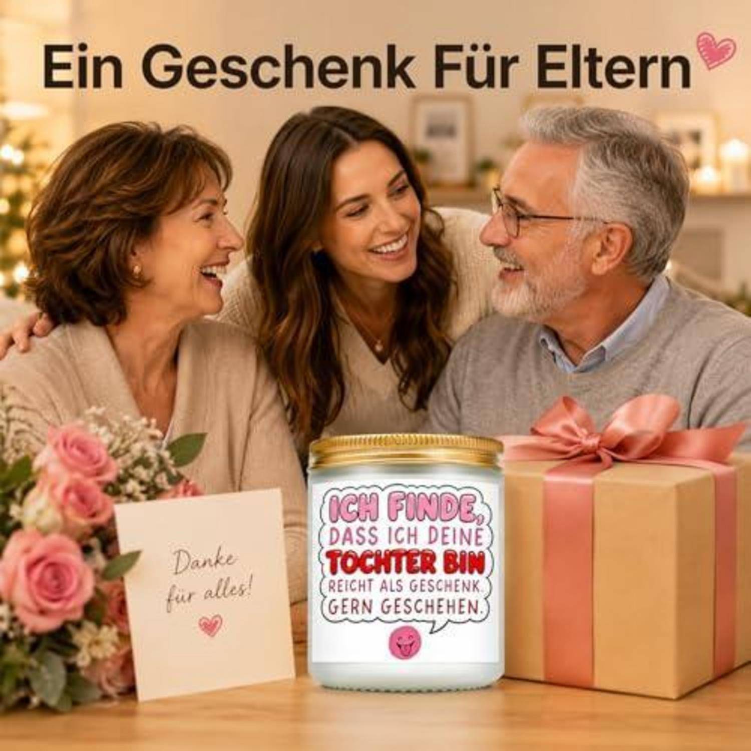Geschenkbild für Eltern mit einer lächelnden Familie, einer Karte „Danke für alles!", einer Kerze mit der Aufschrift „Ich finde, dass ich deine Tochter bin, reich als Geschenk gern geschehen,"" und einem eingepackten Geschenk.