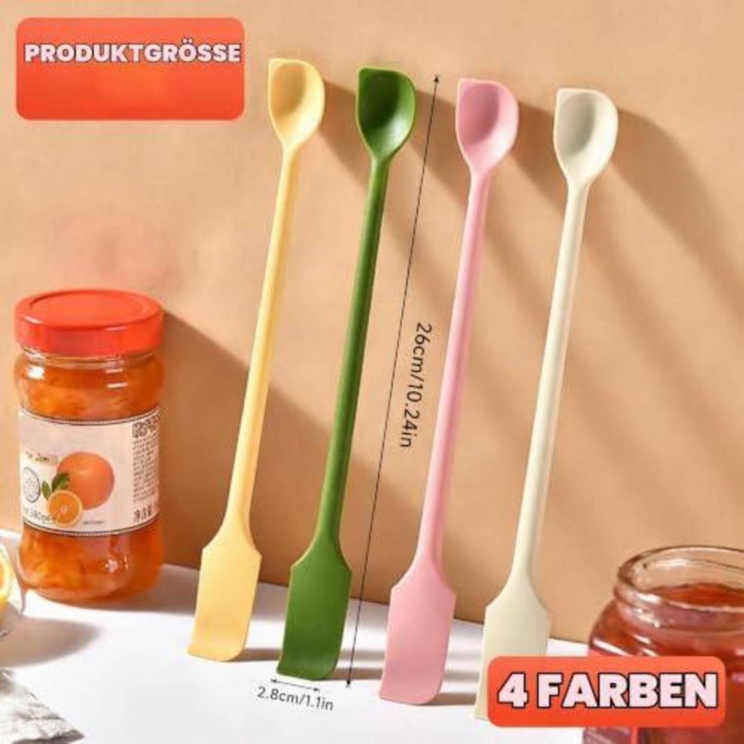 Vier langstielige Silikon-Spatel in Gelb, Grün, Rosa und Creme werden mit Größenetiketten „26cm/10,24in