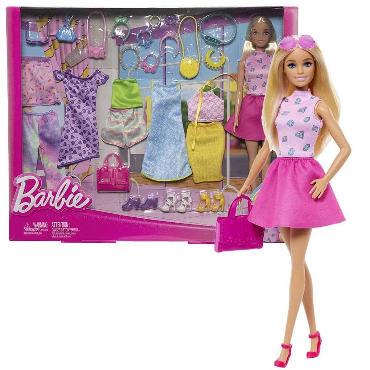 Barbie-Modeset mit zwei Puppen und verschiedenen Kleidern, Schuhen, Taschen und Zubehör, präsentiert in rosa Verpackung.