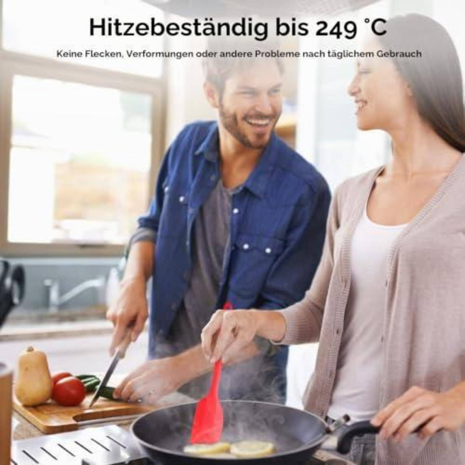 Paar kocht in einer Küche mit einer Antihaftpfanne; Text sagt „Hitzebeständig bis 249°C