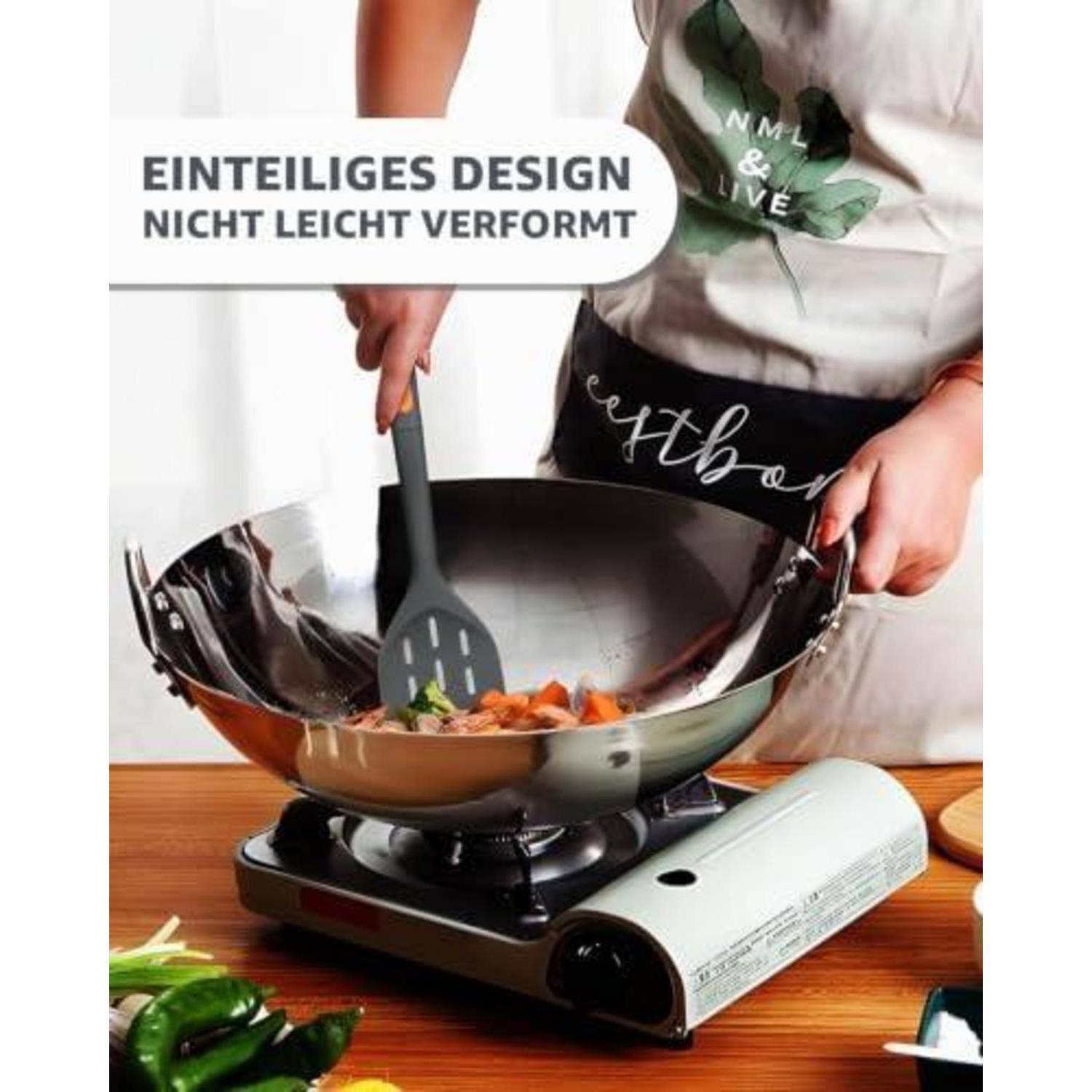 Person kocht mit einem Spatel in einem glänzenden Metall-Wok auf einem tragbaren Herd; der Text besagt „Einteiliges Design, nicht leicht verformt