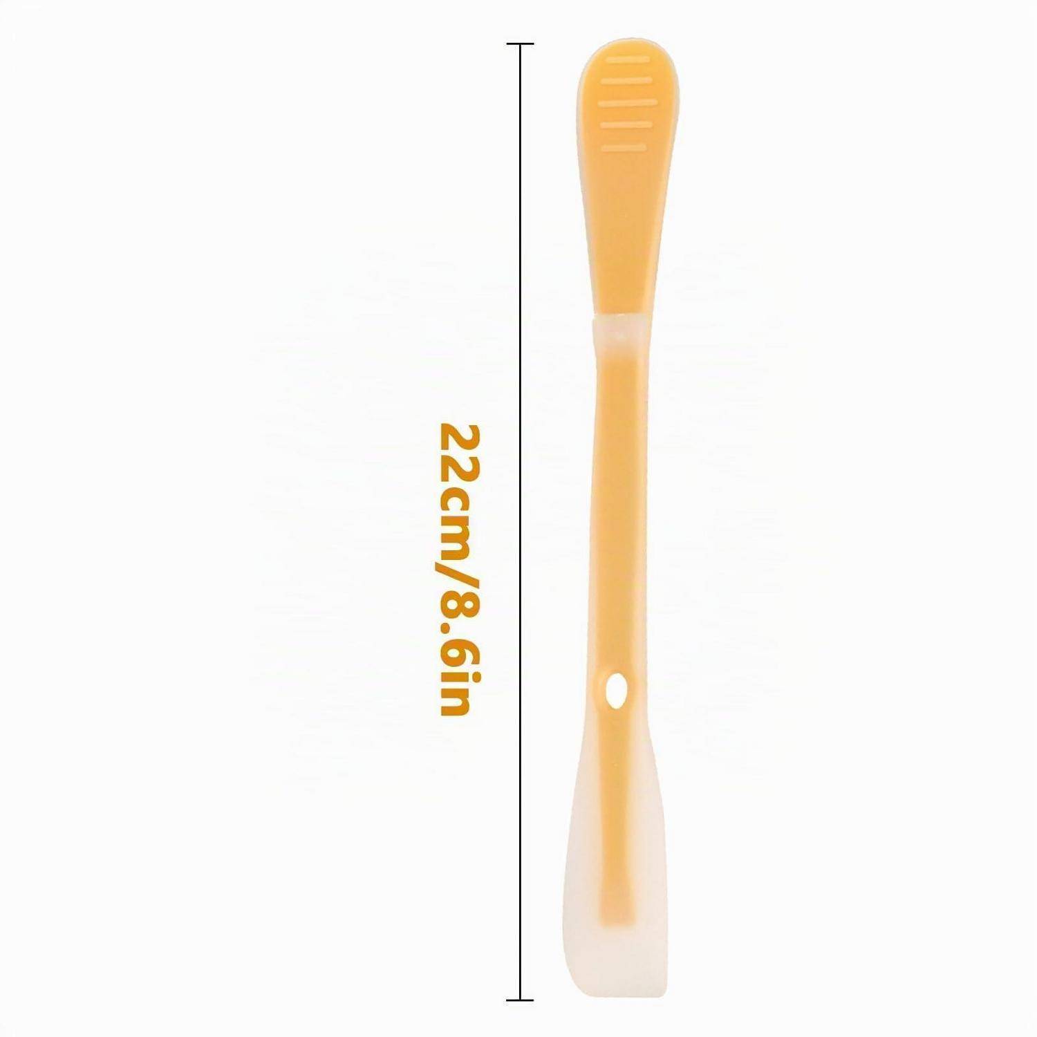 Orange-weiß gepunktete Silikonspatel vertikal gezeigt, beschriftet mit 22cm/8,6in zur Größenreferenz.
