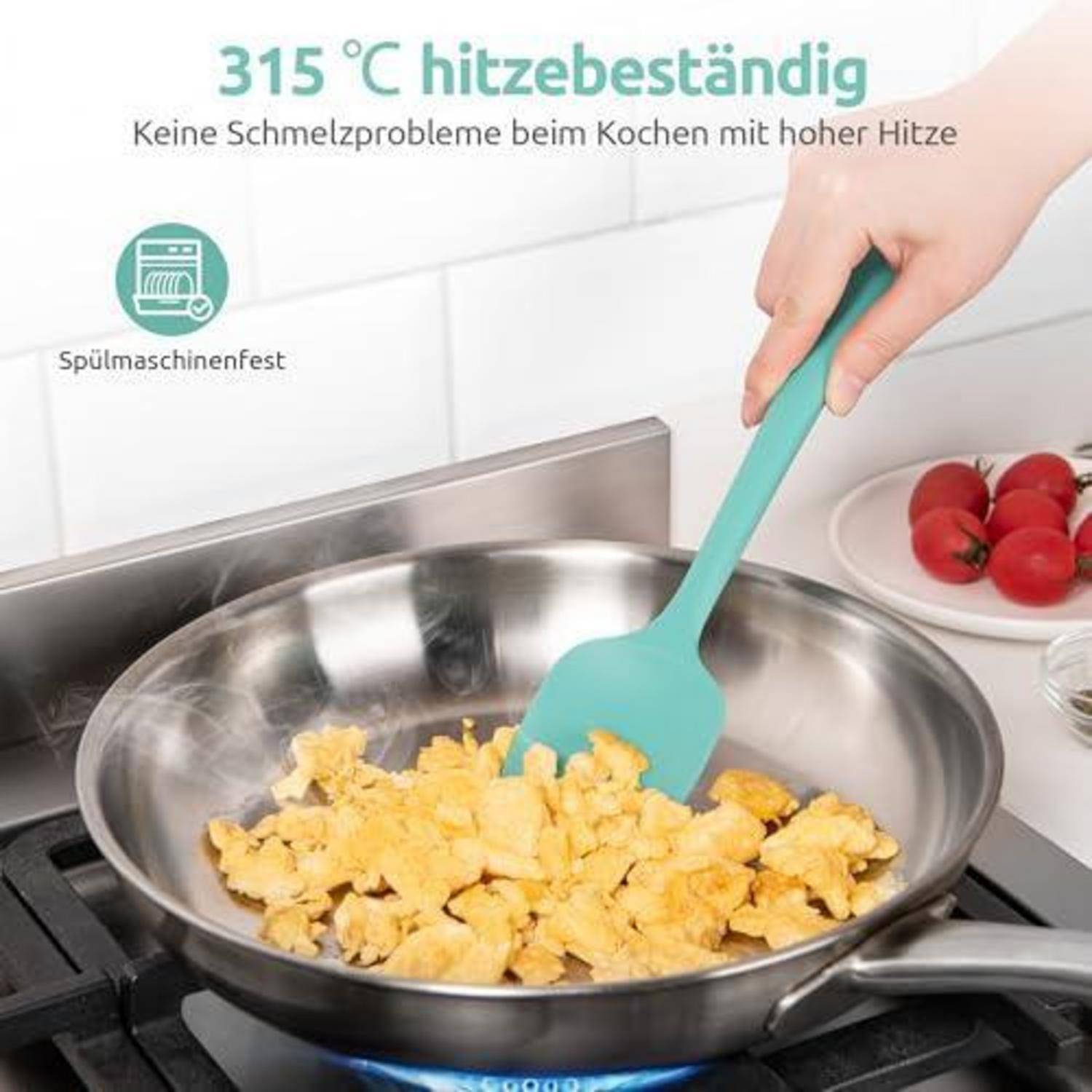 Silikonspatel, der Rührei in einer heißen Edelstahlpfanne umrührt, mit deutschem Text „315 °C hitzebeständig