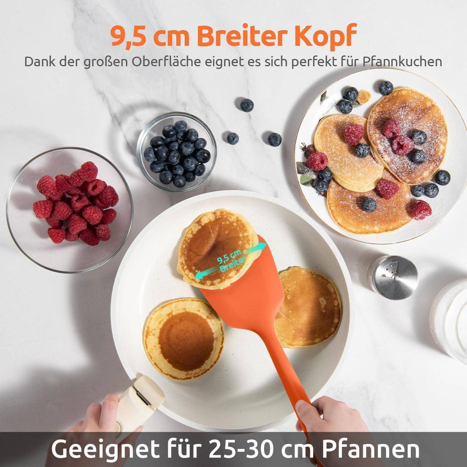Orangefarbener Pfannenwender mit der Beschriftung „9,5 cm breiter Kopf