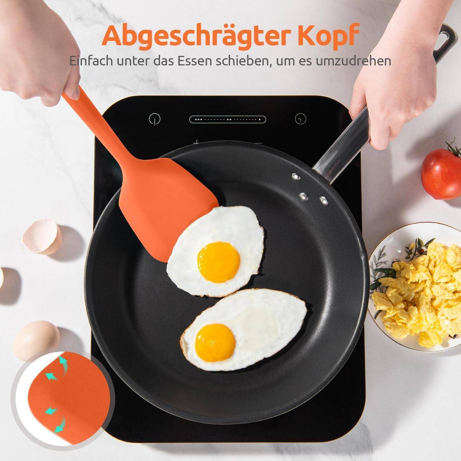 Draufsicht-Küchenanzeige mit einem Spatel unter Spiegeleiern in einer Pfanne; Deutscher Text sagt „Abgeschrägter Kopf