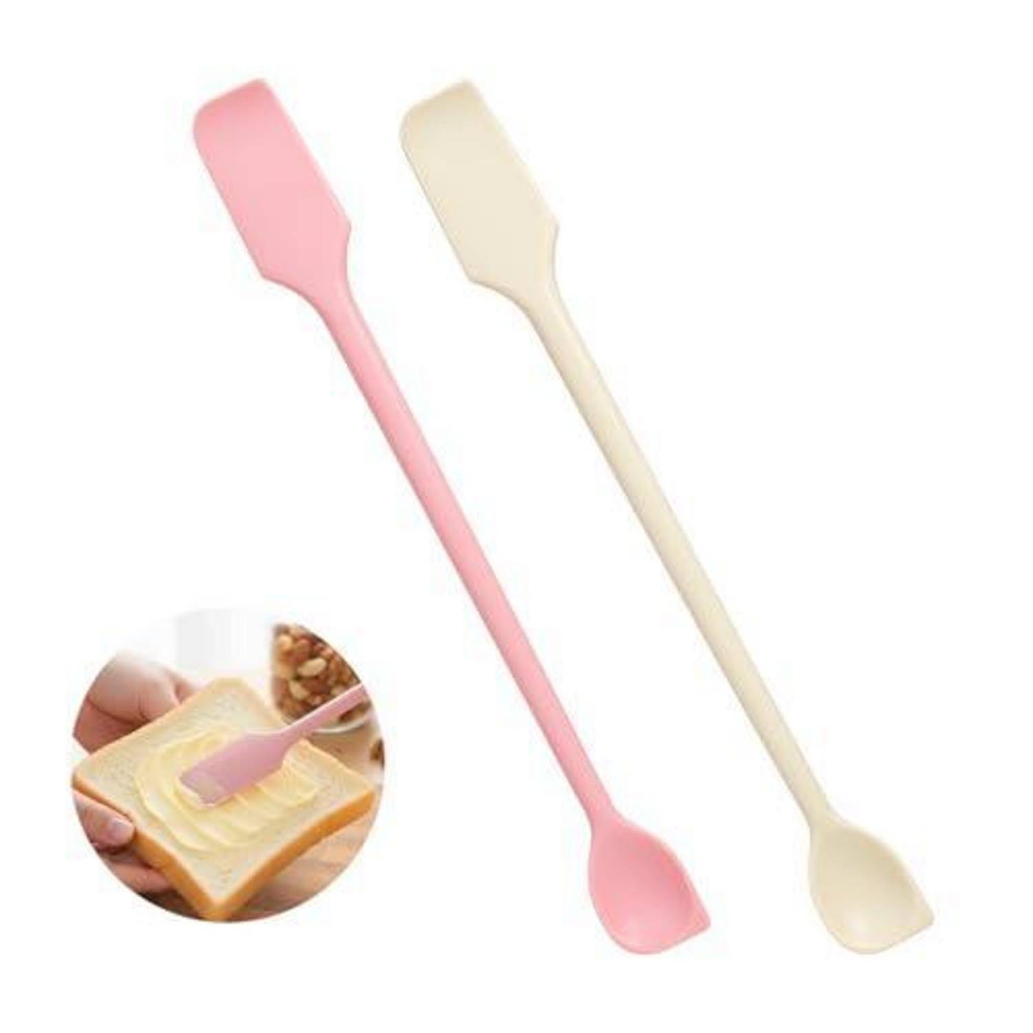 Zwei langstieligen Silikonspatel, einer rosa und einer creme, gezeigt mit einer Nahaufnahme, die einen beim Verstreichen von Butter auf Toast zeigt.