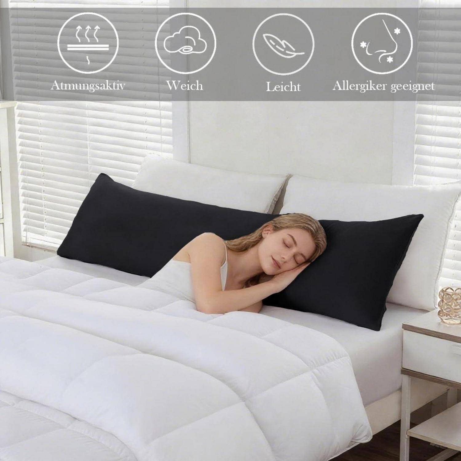 Frau schlafend auf einem weißen Bett mit schwarzen Kissen; obere Symbole auf Deutsch sagen atmungsaktiv, weich, leicht, allergikerfreundlich.