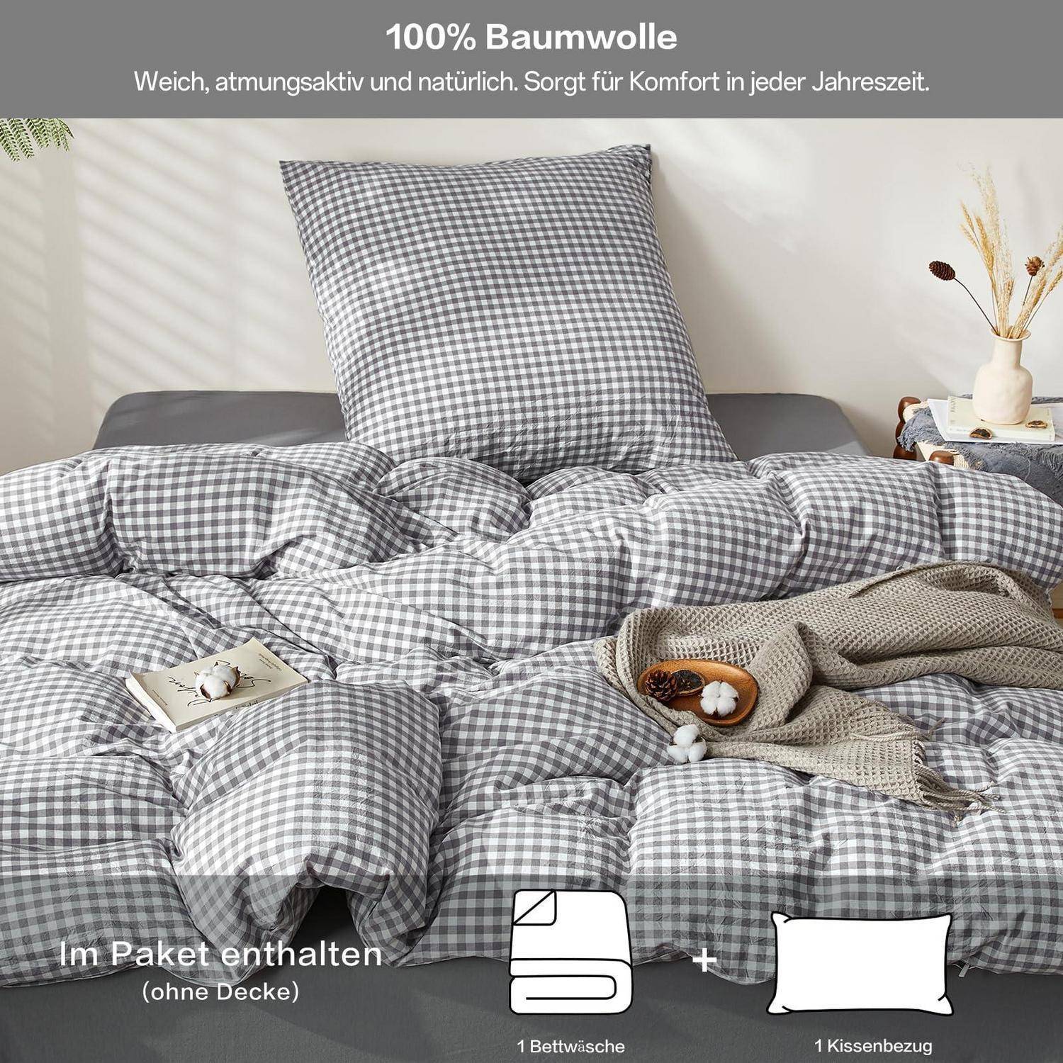Grauer Gingham-Bettwäscheset auf einem Bett, gezeigt mit einem Kissenbezug und einem Bettdeckenbezug; der Text besagt 100% Baumwolle, atmungsaktiv, und „1 Bettwäsche" plus „1 Kissenbezug"" enthalten.