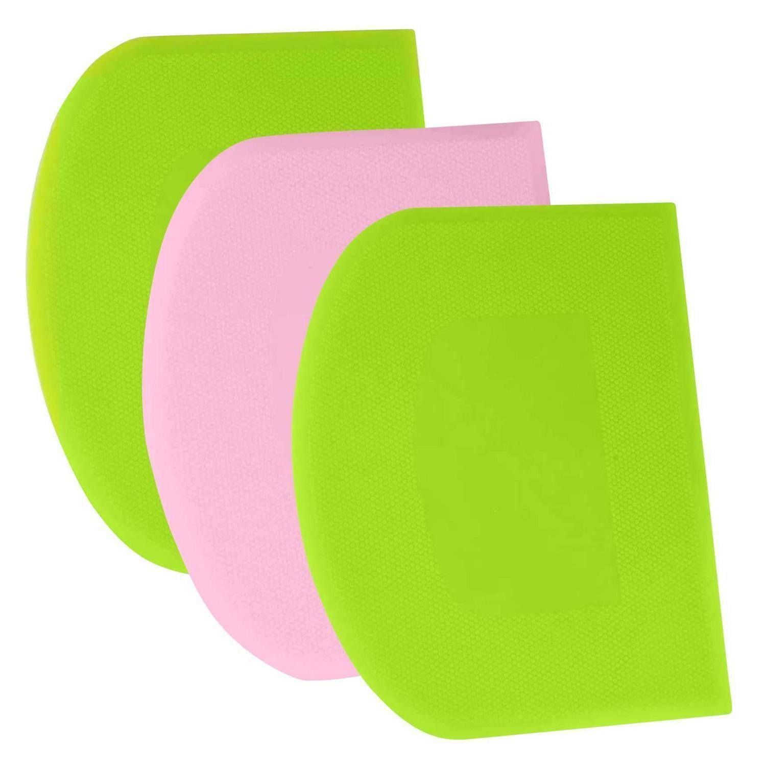Drei sich überlappende gebogene Stoffmuster in Neongrün, Rosa und Neongrün auf weißem Hintergrund.