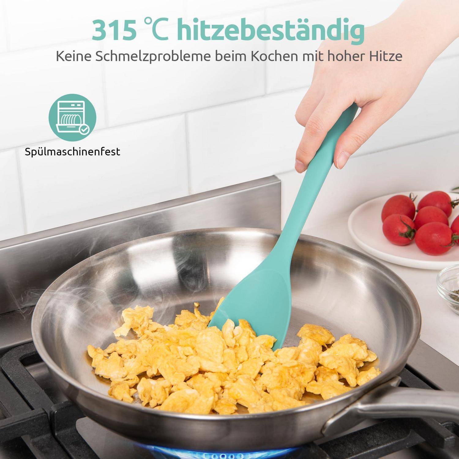 Türkiser Spatel rührt Rührei in einer Pfanne auf einem Kochfeld um; deutscher Text sagt „315°C hitzebeständig