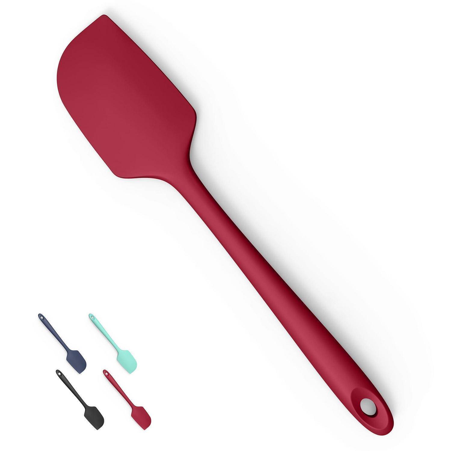 Rote Silikonspatel mit langem Griff und Aufhängeloch, auf weißem Hintergrund mit kleineren Farbvariationen in der Ecke dargestellt.