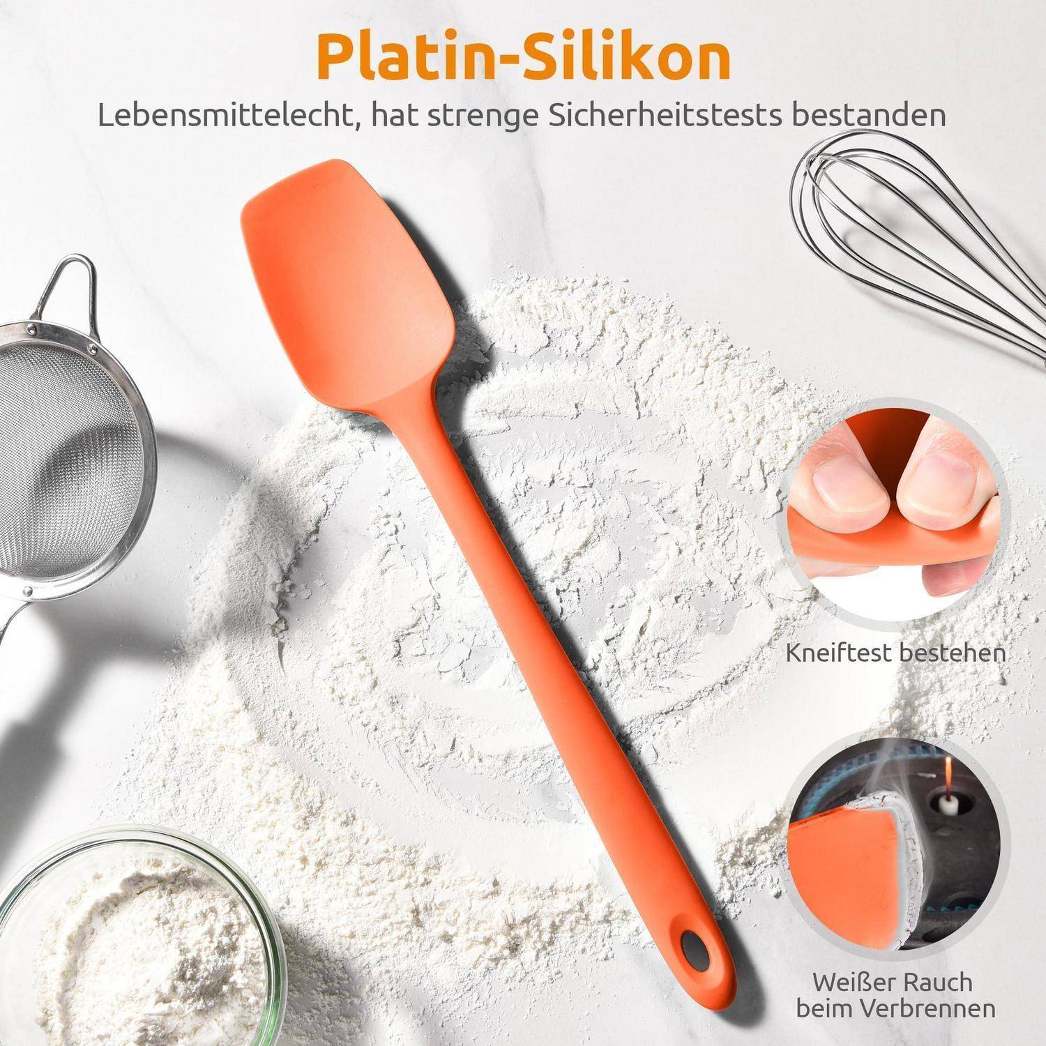 Orange Silikonspachtel mit Backwerkzeugen und Mehl; deutscher Text sagt 