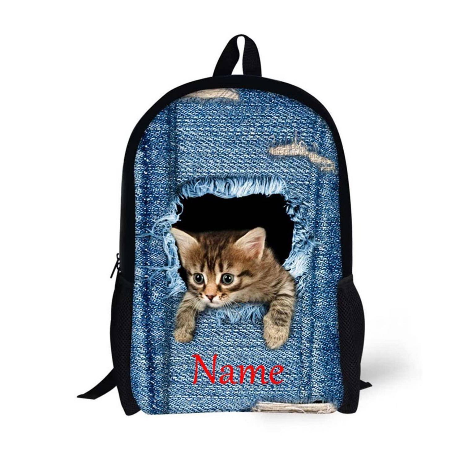 Jeans-Rucksack mit einem Kätzchen, das durch eine zerrissene Tasche lugt, und dem Wort 