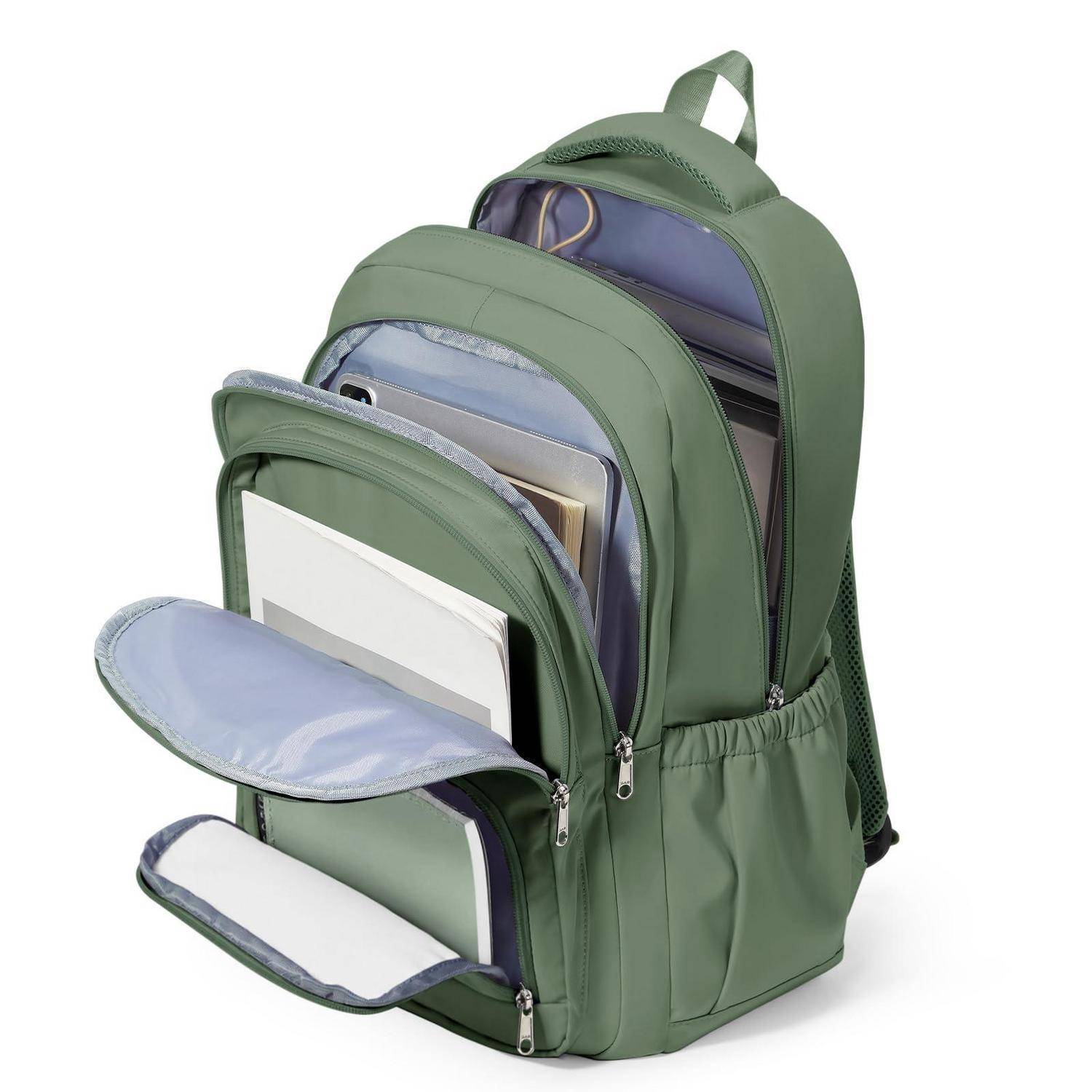 Grüner Rucksack mit mehreren vorderen Reißverschlusstaschen, die geöffnet sind und organisierte Fächer zeigen, in denen Bücher, Ordner und Papiere verstaut sind.