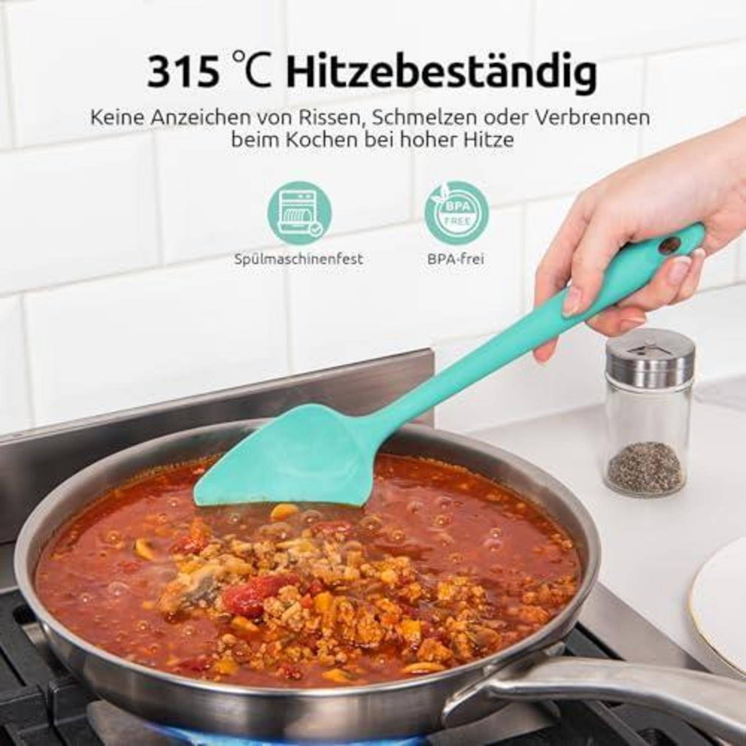 Türkisfarbener Silikonspatel rührt Essen in einer Bratpfanne; Text besagt „bis 315°C hitzebeständig