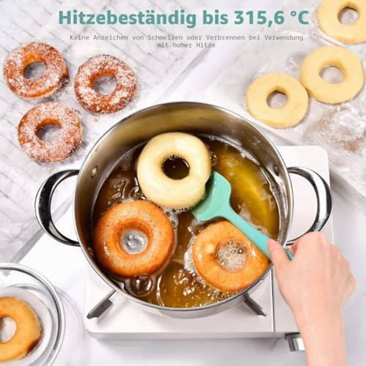 Draufsicht auf Donuts, die in einem Topf auf einer Heizplatte frittiert werden, mit Text, der besagt „Hitzebeständig bis 315,6 °C