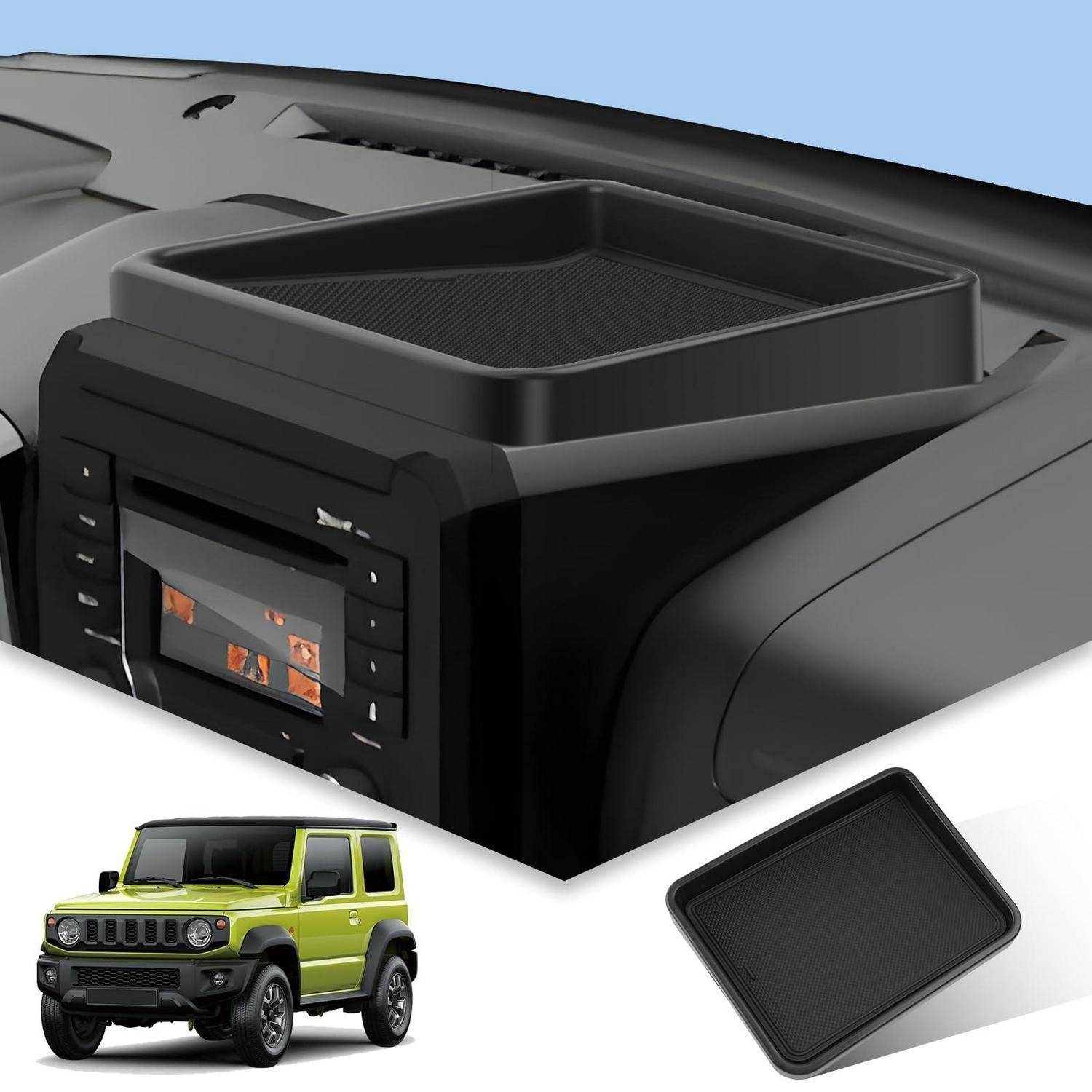 Dashboard-montiertes schwarzes Organizer-Tablett über einem Autostereo, mit herausnehmbarem Tablett-Einsatz neben einem grünen SUV dargestellt.