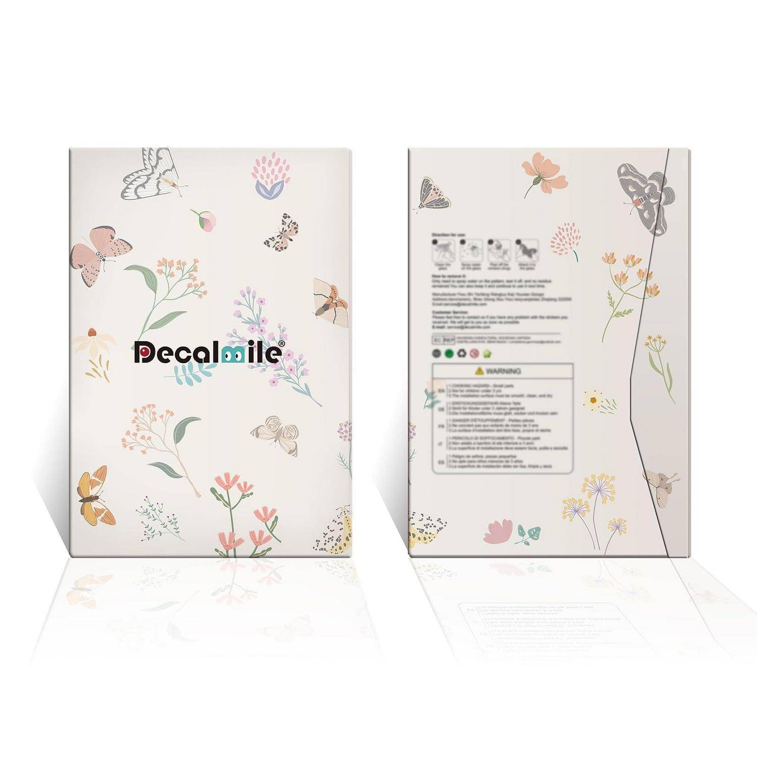 Zwei Ansichten einer dekorativen Wandaufkleber-Box von Decalmile mit Schmetterlings- und Blumenmotiven, die das vordere Logo und die Rückseite mit Produktanleitung und Warnschild zeigen.