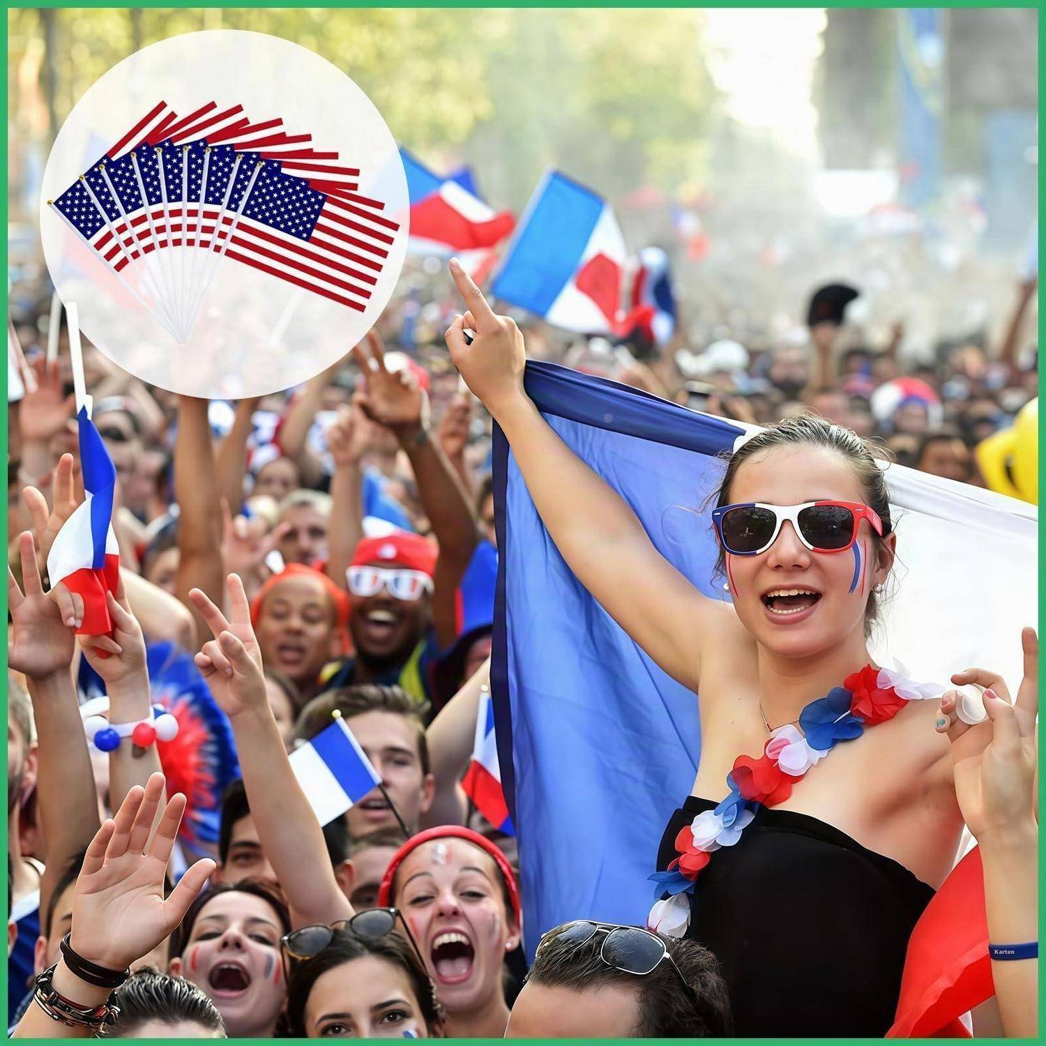 Menschenmenge feiert mit französischen Flaggen; eine Frau mit Sonnenbrille winkt mit einer Trikolore-Flagge in der Front, während ein Schild viele US-amerikanische Flaggen zeigt.