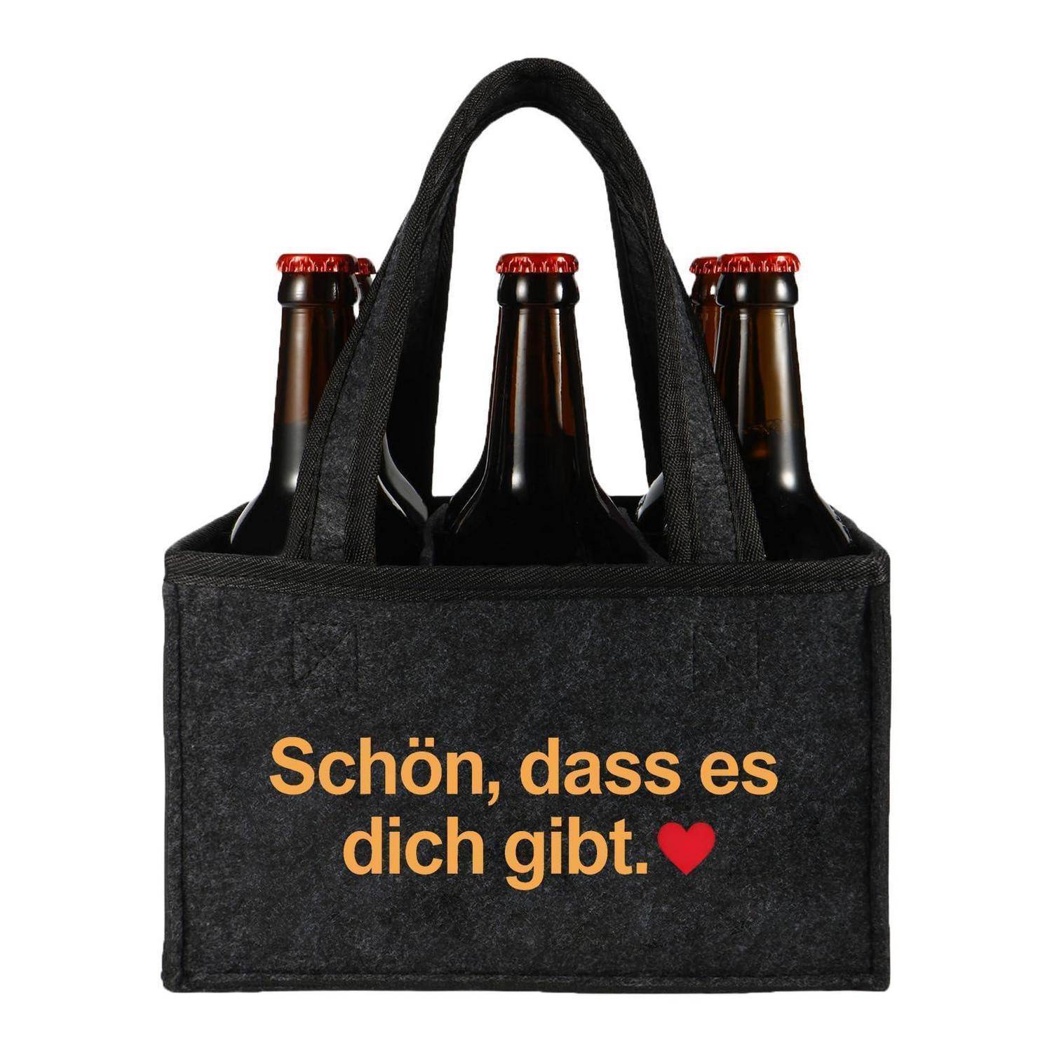 Schwarzer Sechserträger mit drei Bierflaschen und deutschem Text „Schön, dass es dich gibt.