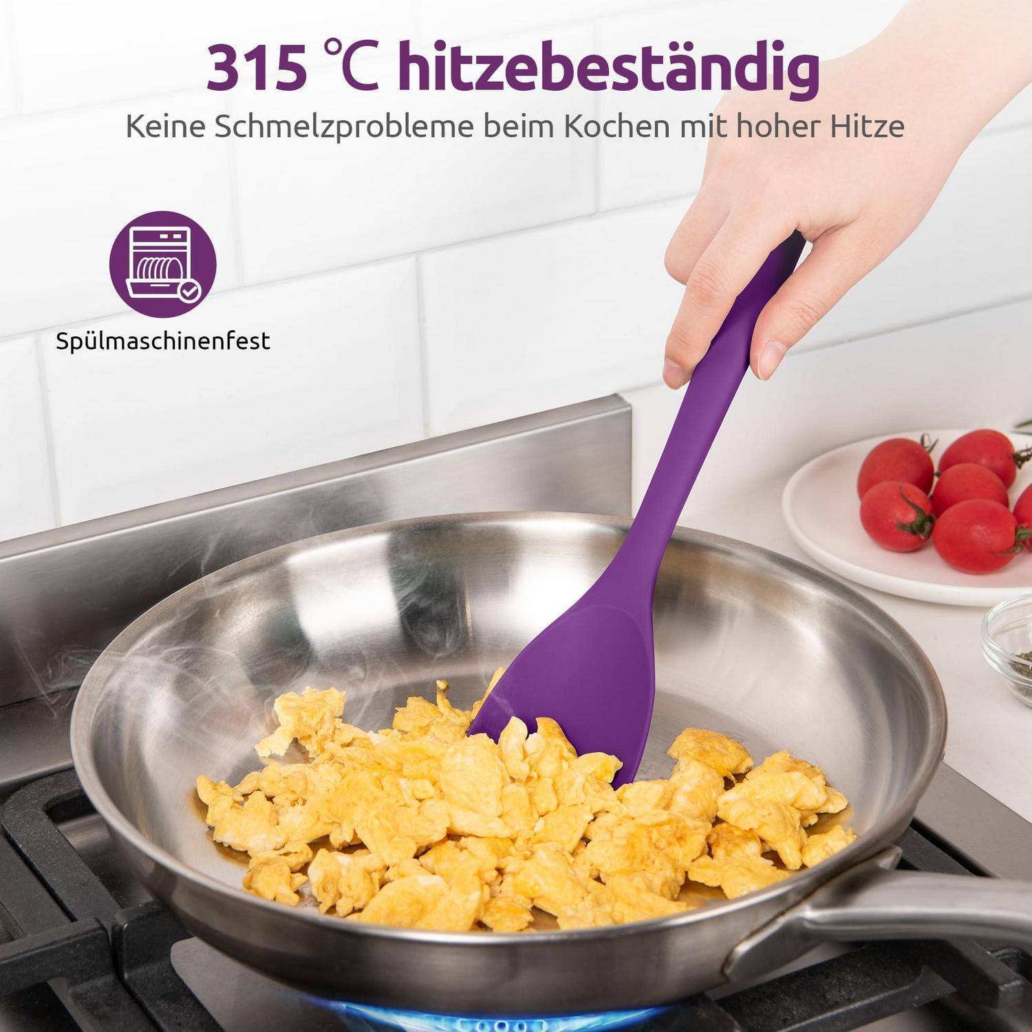 Hand rührt Rührei in einer Edelstahlpfanne mit einem lila Spatel um; Text besagt „315°C hitzebeständig