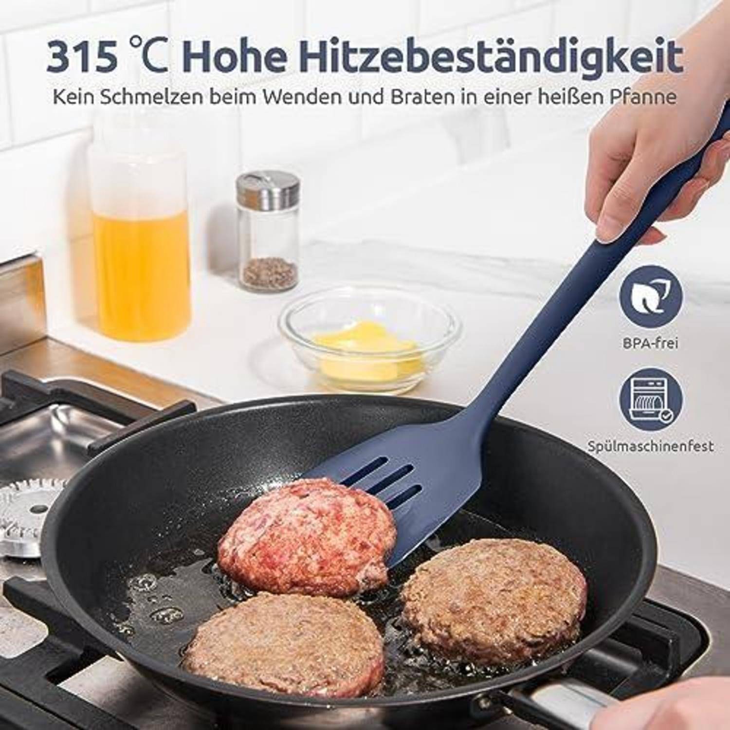 Bratpfanne mit Burgern, die mit einem Spachtel gewendet werden; deutscher Text besagt „Hitzebeständigkeit bis 315°C