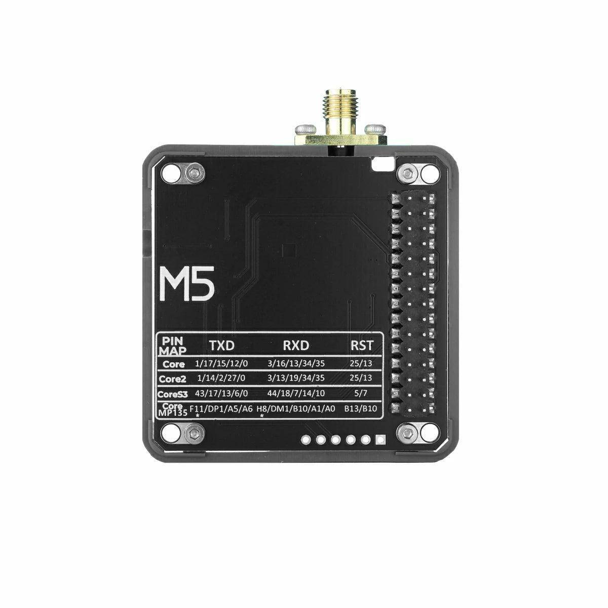 M5Stack-Gerät Vorderansicht mit Pinbelegung und beschrifteten TXD, RXD, RST und Core-Pinzuweisungen auf dem Board gedruckt.