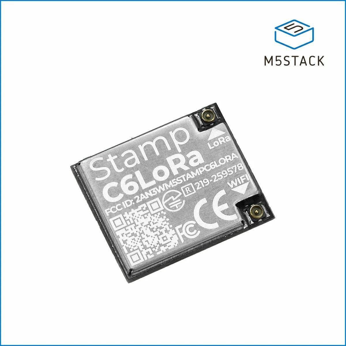 M5Stack Stamp C6LoRa Wireless-Modul auf weißem Hintergrund, mit sichtbaren LoRa-, WiFi- und Zertifizierungsmarkierungen.